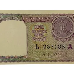 One Rupee Old Issue Year 1951 Signature H.M Patel Violet Color Ending 108 Serial Number **V. Scare** UNC Grade.