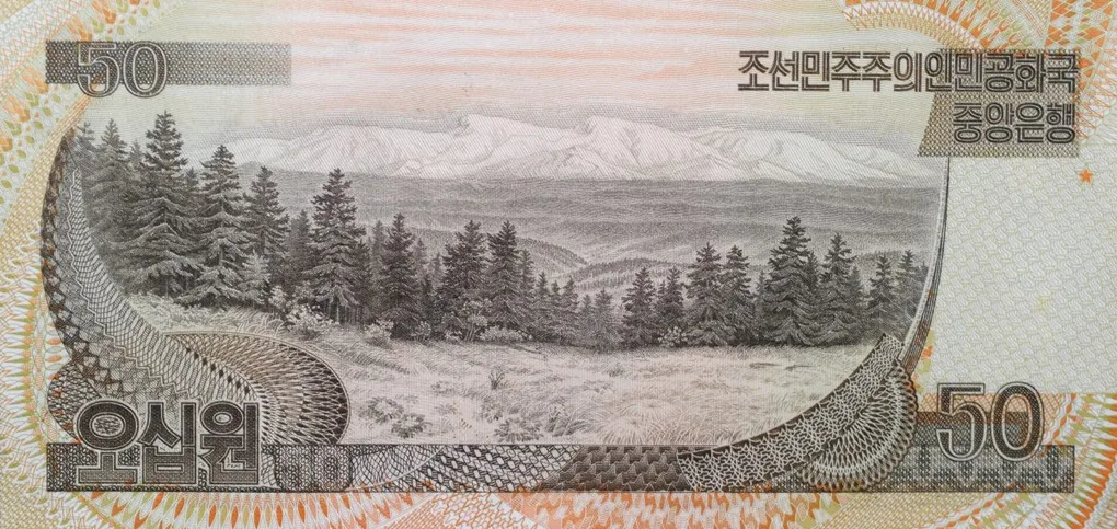 50 Won of North Korea (AD 1992) with Fir trees with Mt. Paekdu and Baekdudaegan mountain range in the background