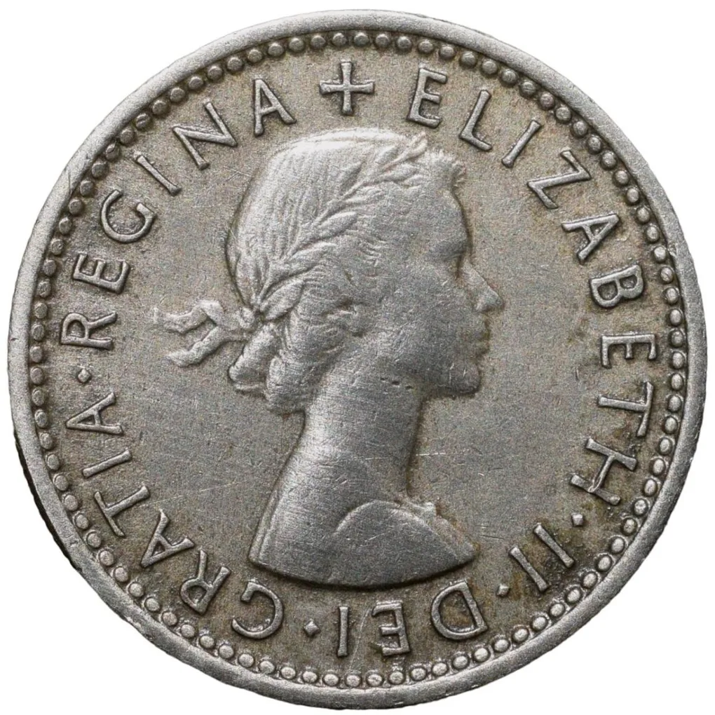 Old Copper-Nickel 6 Pence of Elizabeth II of United Kingdom (AD 1954) with Flowers