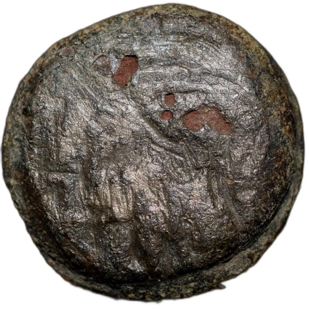 Cast Copper Coin of Bhadra/Mitra Dynasty (3rd - 2nd Cen. BC) with Chhatra above Elephant/Dharma Chakra