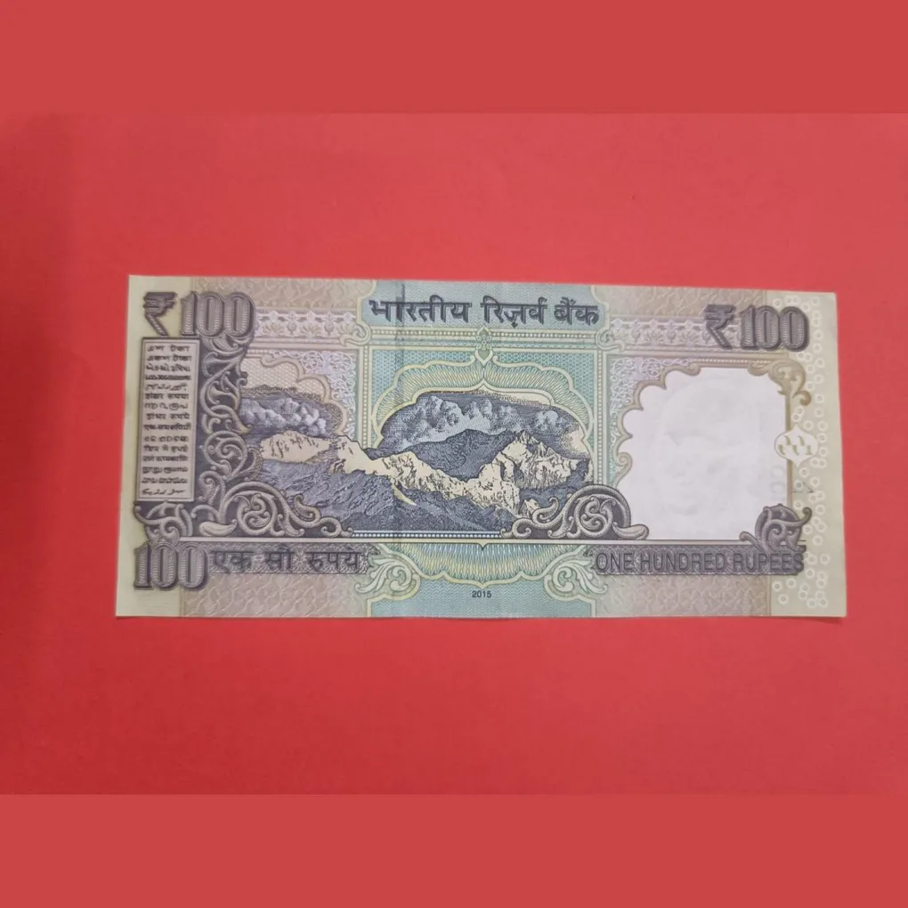 100 Rs Old Issue Semi Fancy Number with Spread Ink Error.
