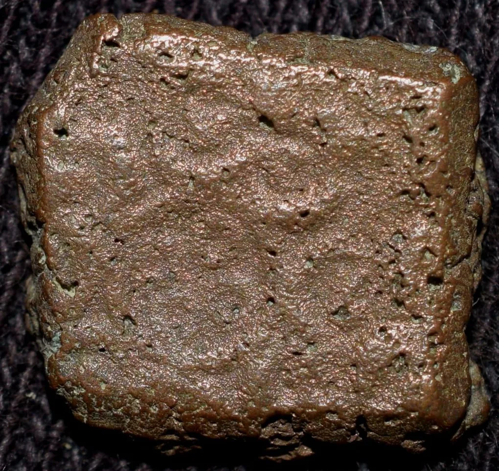 Copper Die-Struck Coin of Eran-Vidisha (200 BC) with Nandyawarta Symbol