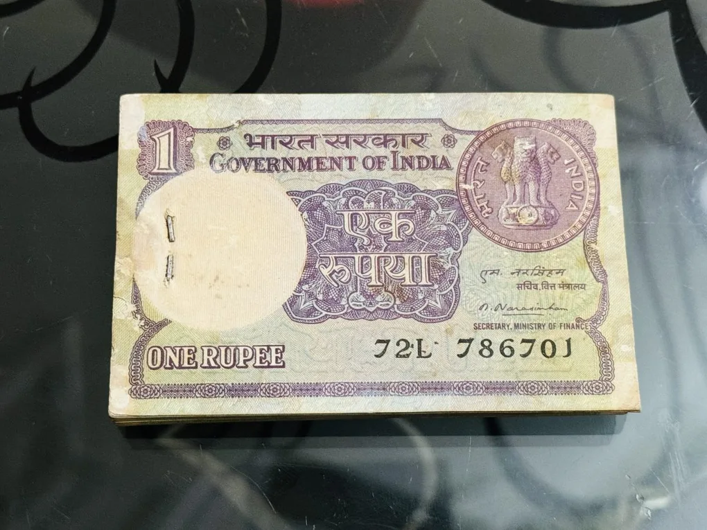 Extremely Rare issue 1rs Bundle with number 786 786 signed by narsimha