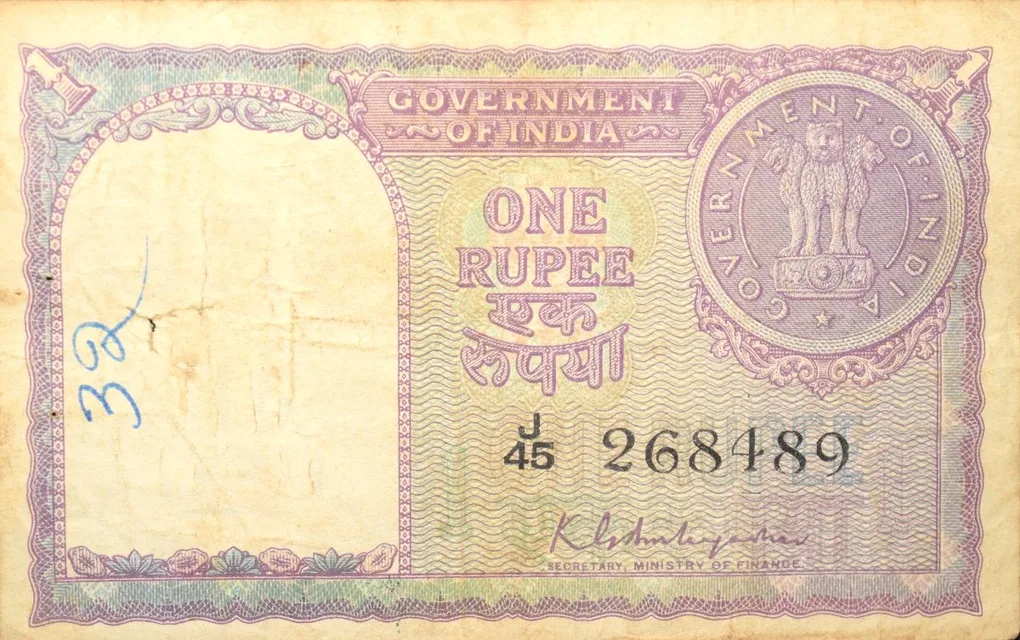 1 Rupee of Republic India (AD 1951) K.G. Ambegaonkar Signature - Violet color - Floral Motif is replaced by a Coin of 1951 Very Rare