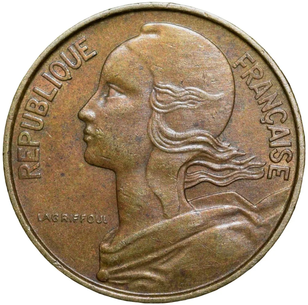 Brass 10 Centimes of France ( AD 1963) with Marianne face left