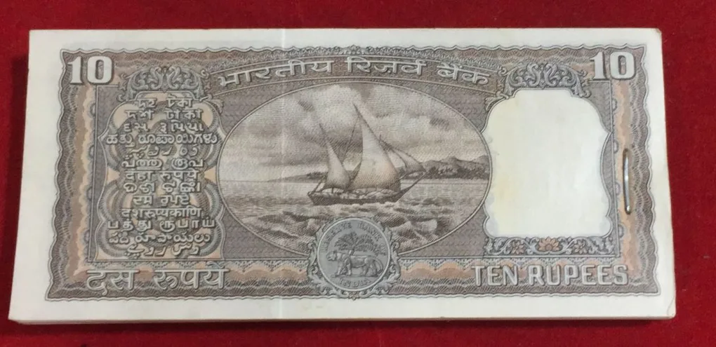 10 Rupees Old Issue Governor Manmohan Singh Serial Packet GEM UNC Chocolate Condition