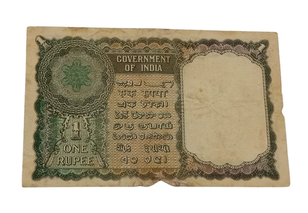 One Rupee Old Floral Motif Design First Issue K.R K Menon with Semi-Fancy Reverse 786 Serial Numbers**EX-RARE** High Collectable Grade with Minor Torns.