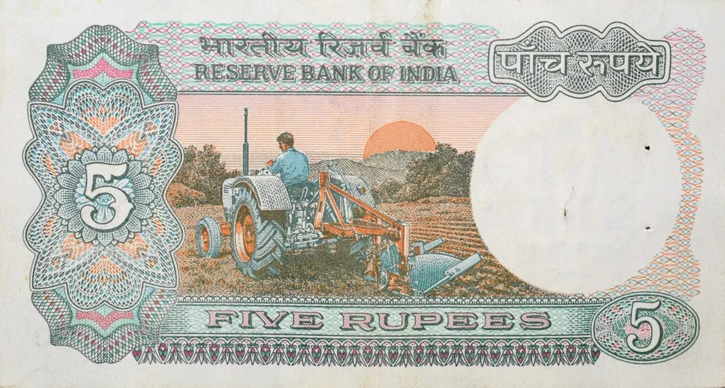 5 Rupees of Republic India (AD 1985-1990) with Farmer ploughing with a tractor while sun is rising - R.N. Malhotra Signature
