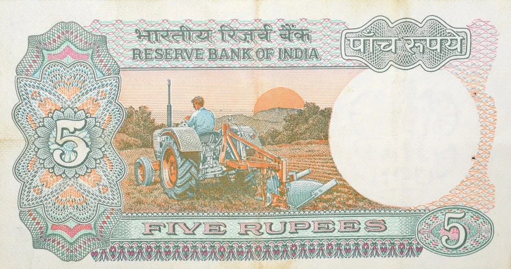 5 Rupees of Republic India (AD 1985-1990) with Farmer ploughing with a tractor while sun is rising - R.N. Malhotra Signature