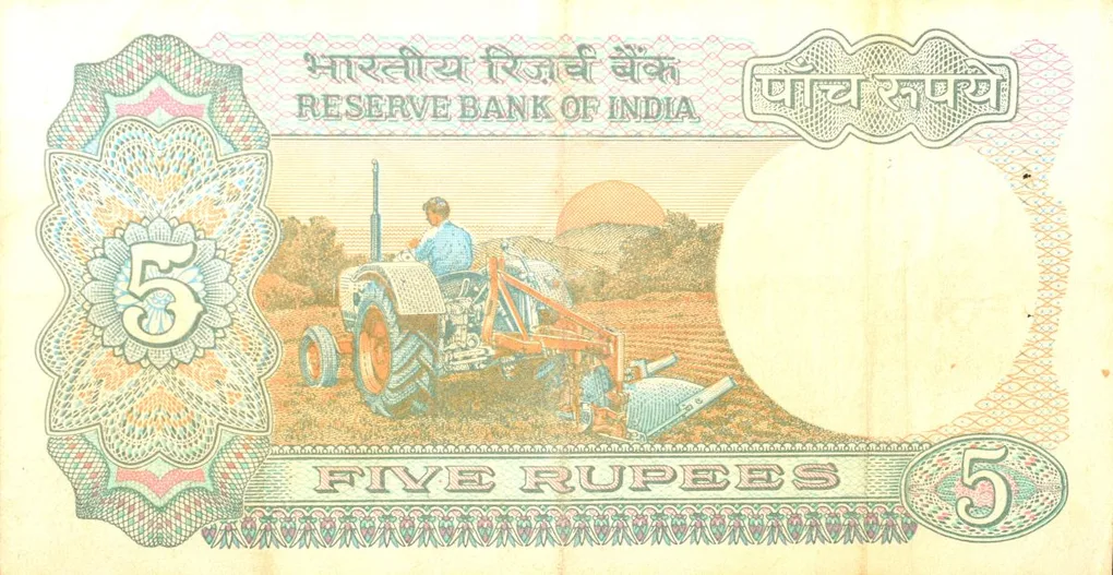 5 Rupees of Republic India (AD 1985-1990) with Farmer ploughing with a tractor while sun is rising - R.N. Malhotra Signature