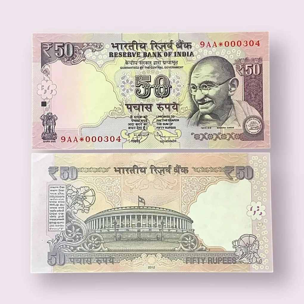 Rs 50 Star Replacement Low Serial 000304 Prefix 9AA Signed by D Subbarao Year 2012 Issue Gem Unc