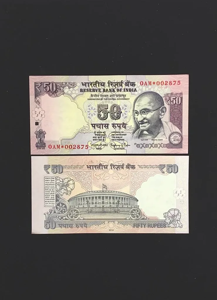 FS 35 Rs 50 Star Replacement Issue Signed by Raghuram Rajan Inset R Year 2014 Issue Prefix 0AM Gem Unc