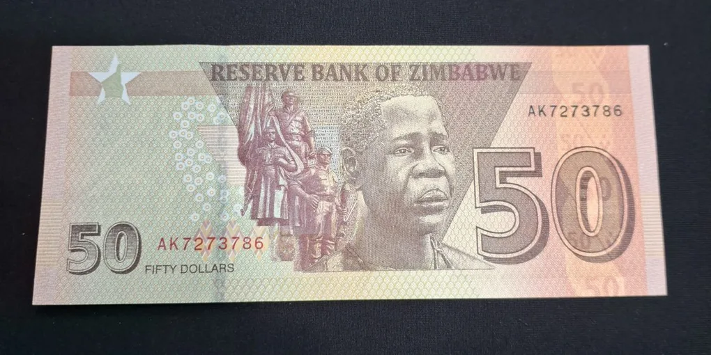 50 Dollar Zimbabwe GEM UNC Condition Ending 786