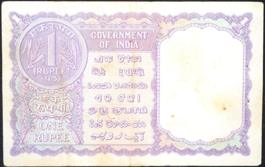 1 Rupee of Republic India (AD 1951) K.G. Ambegaonkar Signature - Violet color - Floral Motif is replaced by a Coin of 1951 Very Rare