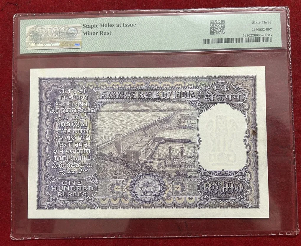 100 Rupees Big size note governer, P.C.Bhatacharya PMG grading 63….Rare Note