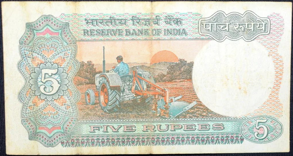 5 Rupees of Republic India (AD 1985-1990) with Farmer ploughing with a tractor while sun is rising - R.N. Malhotra Signature