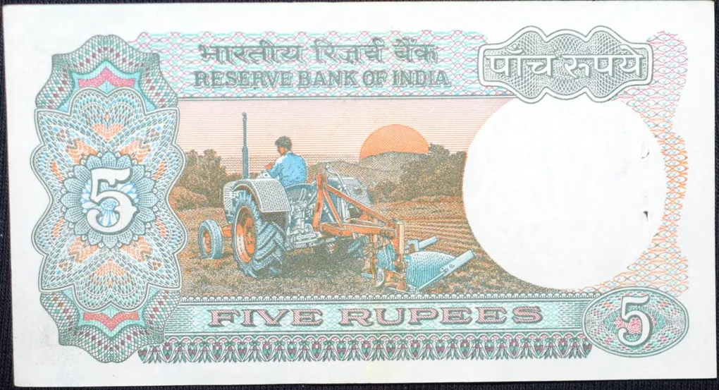5 Rupees of Republic India (AD 1985-1990) with Farmer ploughing with a tractor while sun is rising - R.N. Malhotra Signature