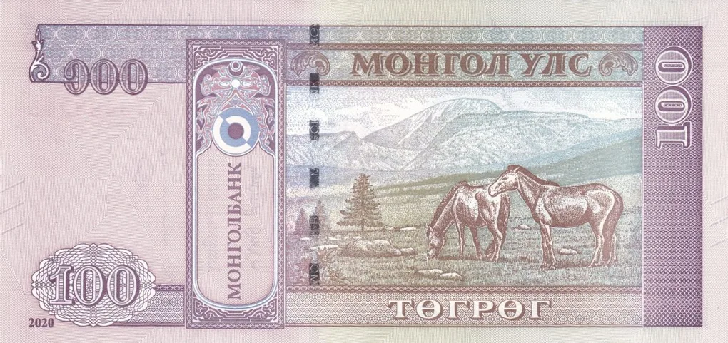 100 Togrog of Mongolia Country (AD 2020) with Mountain scenery with horses grazing in a valley