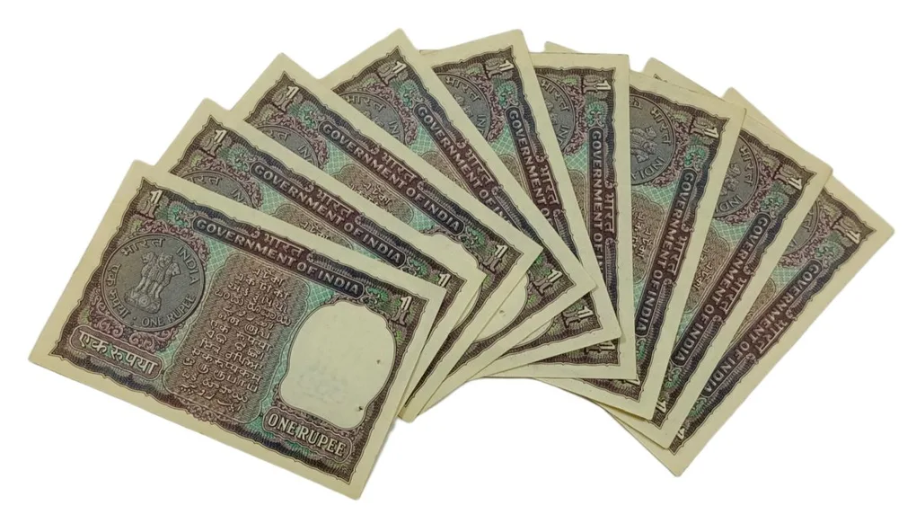 One Rupee I.G Patel Old COMM. Issue “Gandh” Middle 541 SAI Numbers Serially 9 Notes **V. Scare** UNC Grades.