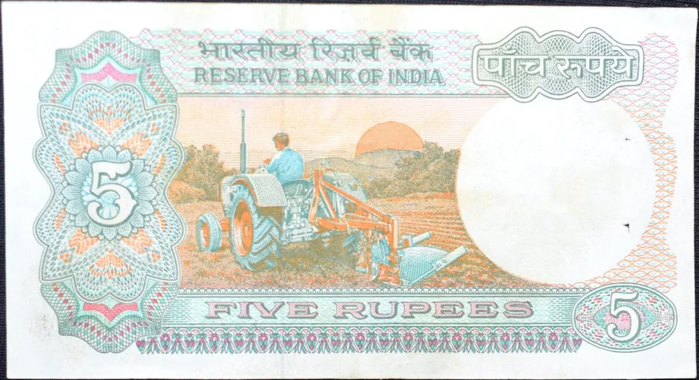 5 Rupees of Republic India (AD 1985-1990) with Farmer ploughing with a tractor while sun is rising - R.N. Malhotra Signature