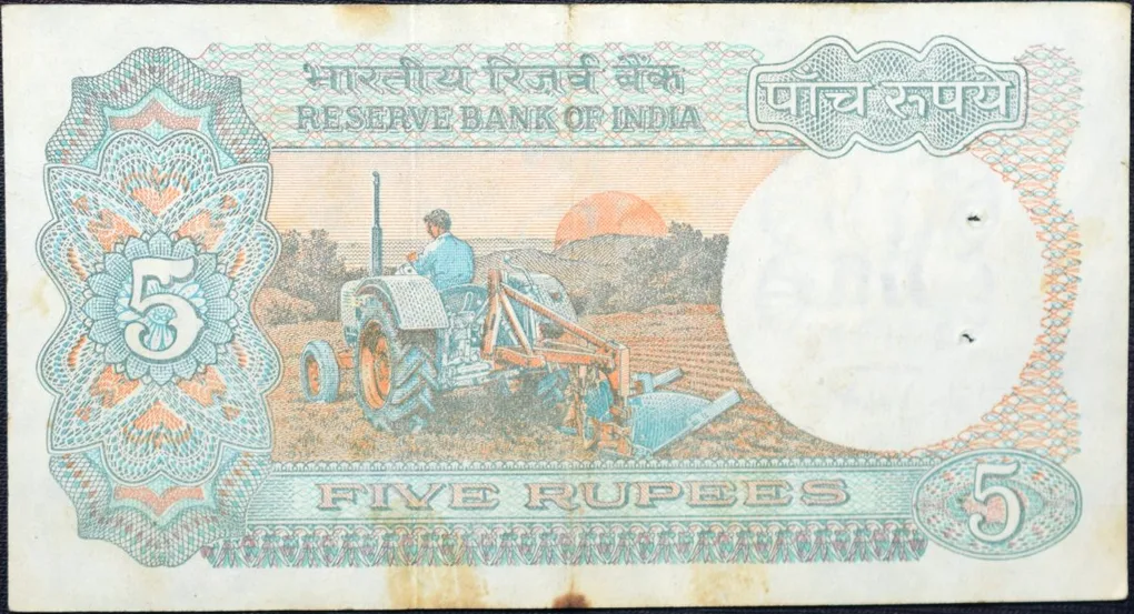 5 Rupees of Republic India (AD 1987-1997) with Farmer ploughing with a tractor while sun is rising - C. Rangarajan Signature