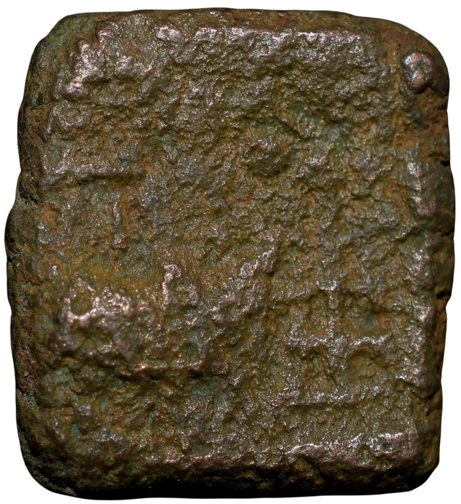 Copper Coin of Ujjaini(2nd Cen. BC) with Bull Walking Right, Triangular headed/Ujjaini Symbol