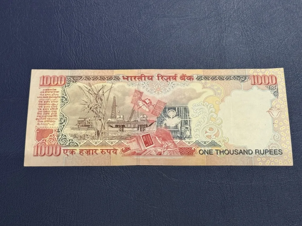 Error 1000rs signed by bimal with one side number missing