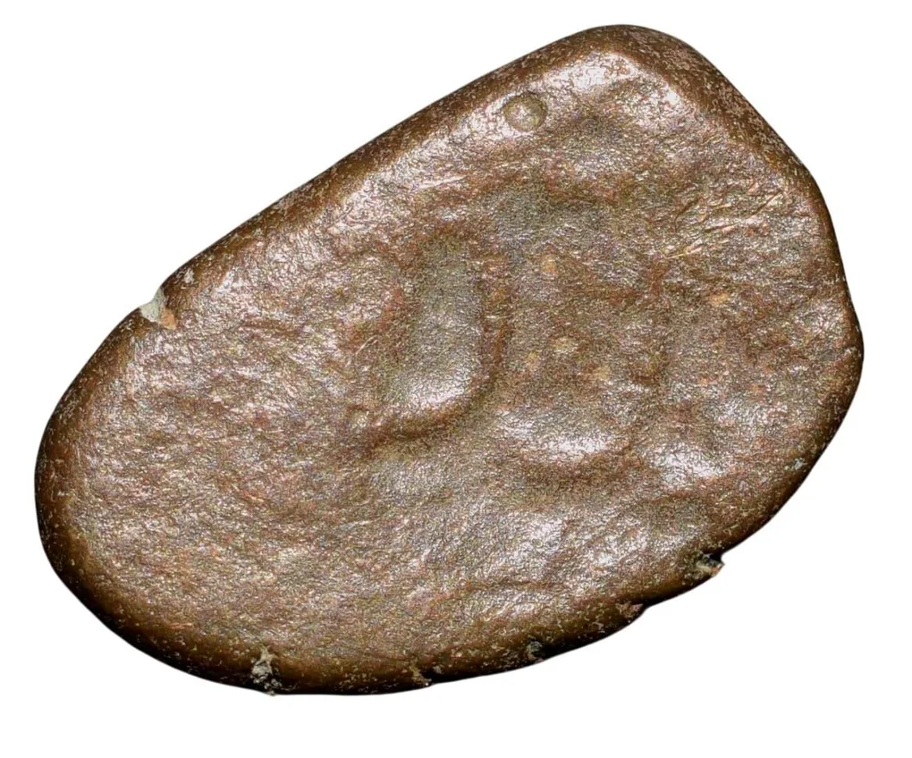 Copper Coin of Rashatrakutas Series (5th - 7th Cen. AD) with Deity Seated with Folded Legs