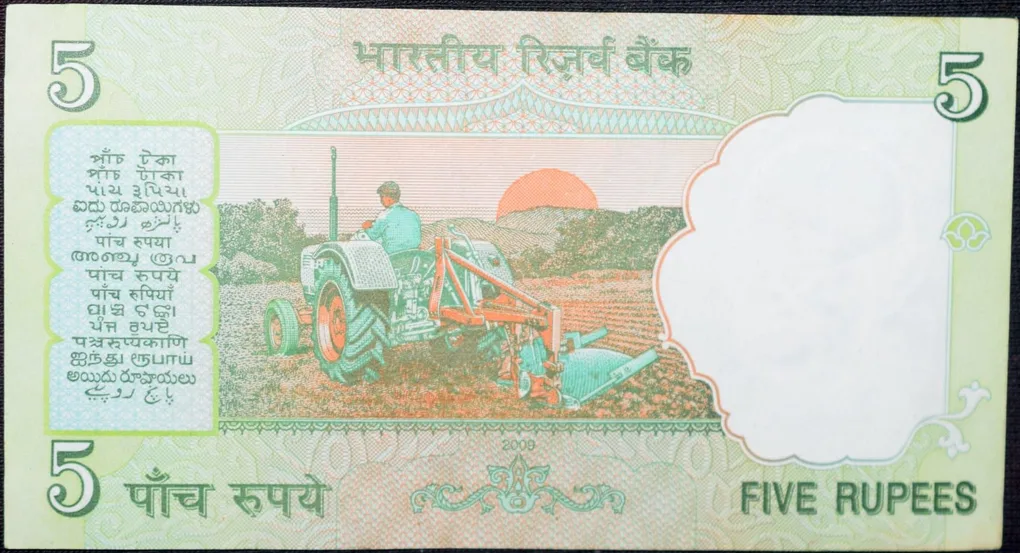 5 Rupees of Republic India (AD 2009) with Farmer ploughing with a tractor while sun is rising - D.Subba Rao Signature