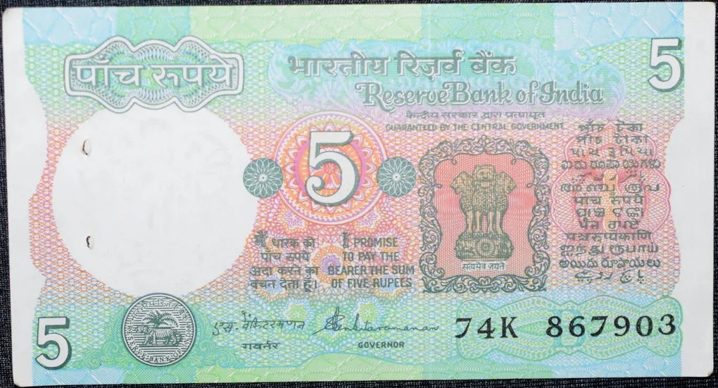 5 Rupees of Republic India (AD 1988) with Farmer ploughing with a tractor while sun is rising - S. Venkitaramanan Signature