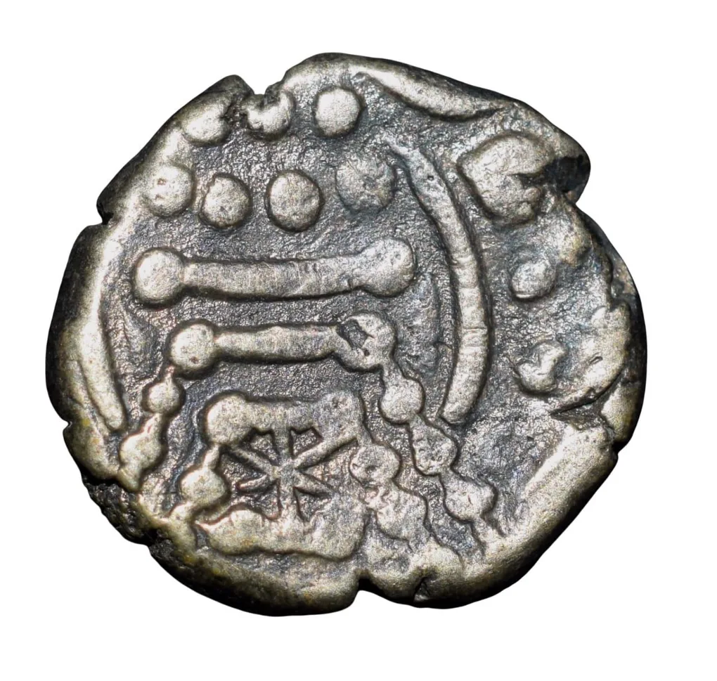Silver Dracham of Chavadas of Gujrat(AD760-850) Profile Bust in Crude Form Deyell # 155