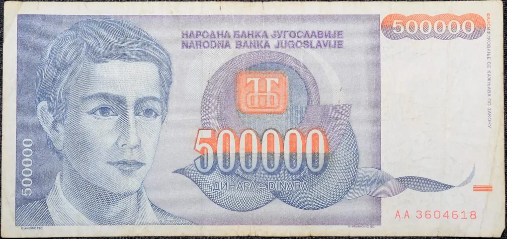 500,000 Dinars of Yugoslavia (AD 1993) with Portrait of a boy/Scene of snow-covered chalets at Kopaonik Ski Center (Southern Serbia)