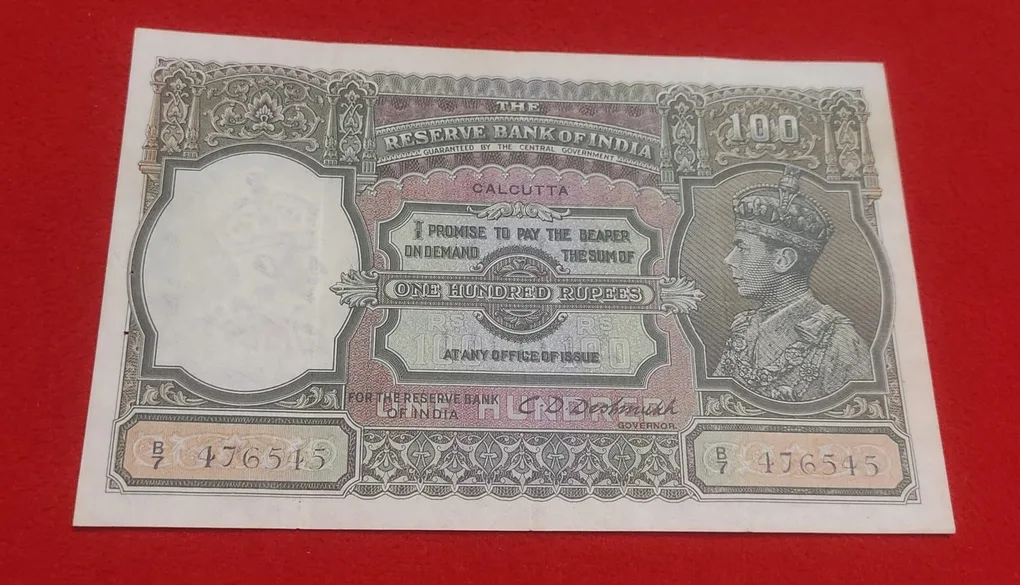 100 Rupees Note British India KGVI Governor C. D. Deshmukh Calcutta Mint in High Collectable Grade Serial Number 476545