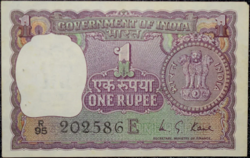 1 Rupee of Republic India (AD 1973) M.G. Kaul - Violet color. Smaller watermark window and numbers to the left. Large ornamental 1 in the centre