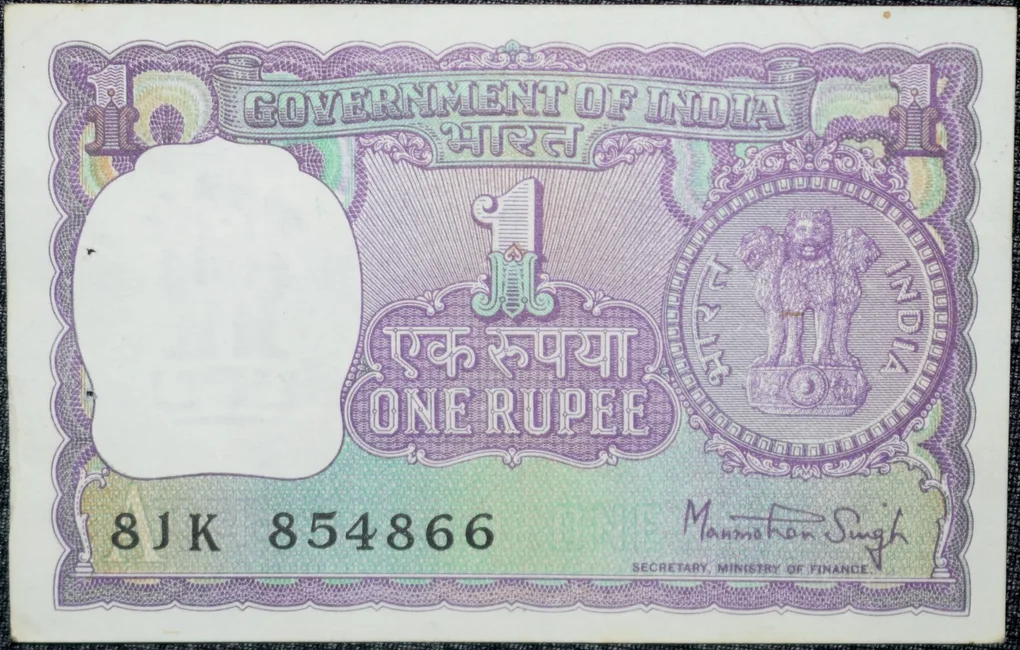 1 Rupee of Republic India (AD 1978) Manmohan Singh Signature - Violet color. Smaller watermark window and numbers to the left. Large ornamental 1 in the centre