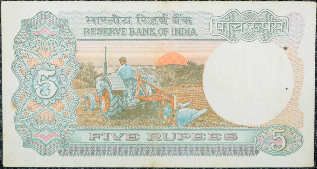 5 Rupees of Republic India (AD 1985-1990) with Farmer ploughing with a tractor while sun is rising - R.N. Malhotra Signature