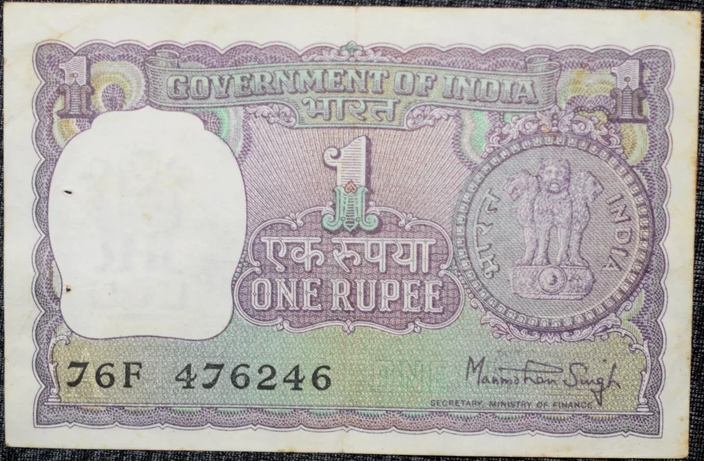 1 Rupee of Republic India (AD 1978) Manmohan Singh - Violet color. Smaller watermark window and numbers to the left. Large ornamental 1 in the centre