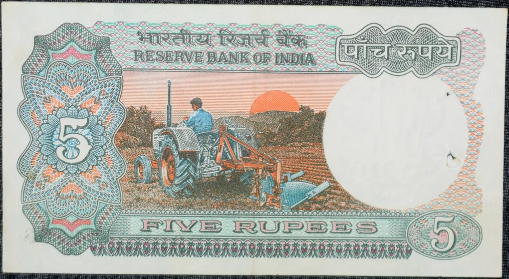 5 Rupees of Republic India (AD 1985-1990) with Farmer ploughing with a tractor while sun is rising - R.N. Malhotra Signature