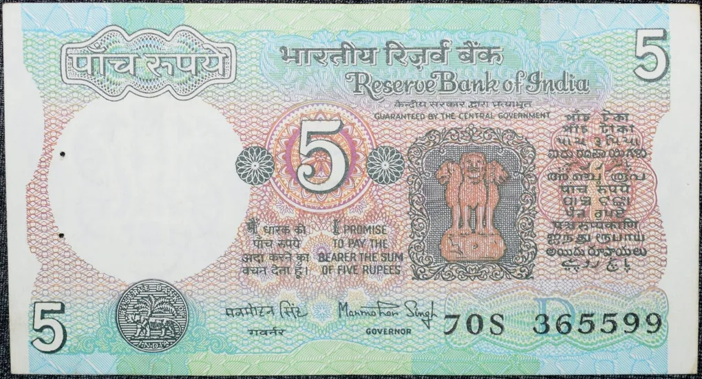 5 Rupees of Republic India (AD 1983) with Farmer ploughing with a tractor while sun is rising - Manmohan Singh Signature