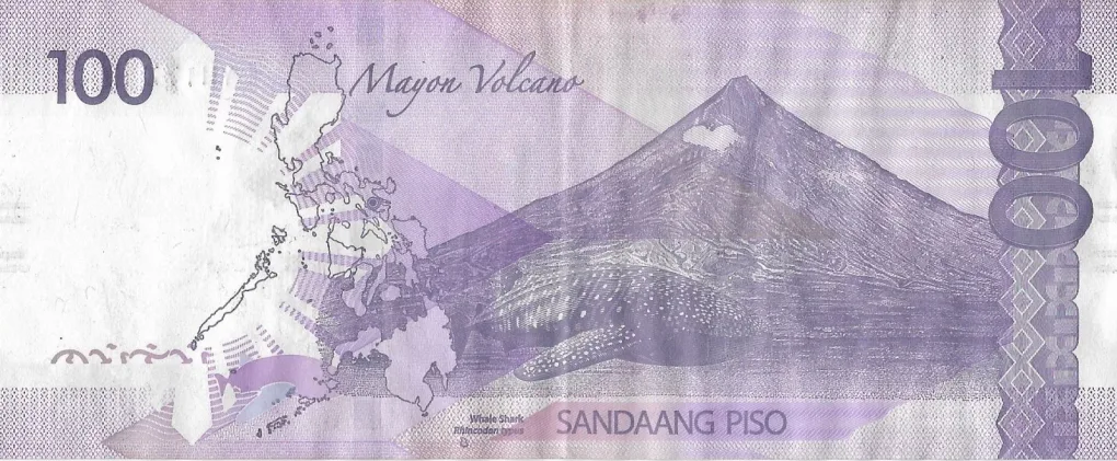 100 Piso of Pilipinas (AD 2025) with Front facing Manuel A. Roxas/Mayon Volcano in background, whale shark (Rhincodon typus)