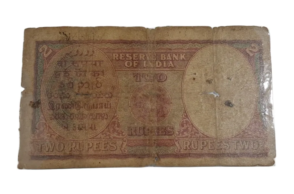 BRITISH INDIA 2 Rupees C.D DESHMUKH King GEORGE-VI **SCARE** Used Condition and "LAMINATED" Note.