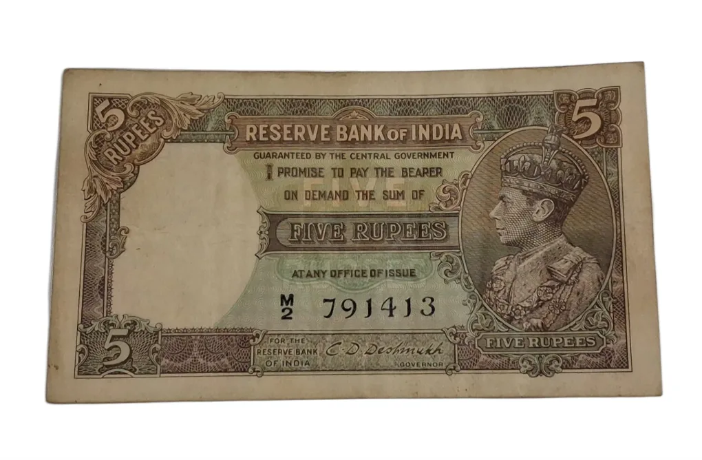 BRITISH INDIA 5 Rupees C.D DESHMUKH King GEORGE-VI **SCARE** High Collectable Grade but "LAMINATED" Note.