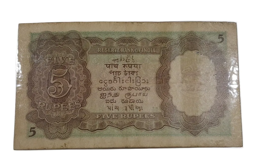BRITISH INDIA 5 Rupees C.D DESHMUKH King GEORGE-VI **SCARE** High Collectable Grade but "LAMINATED" Note.