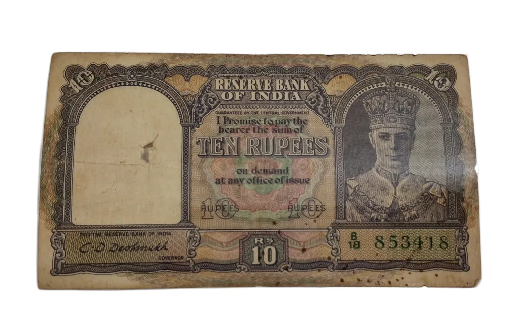 BRITISH INDIA 10 Rupees C.D DESHMUKH King GEORGE-VI in Collectable Grade but "LAMINATED" Note.