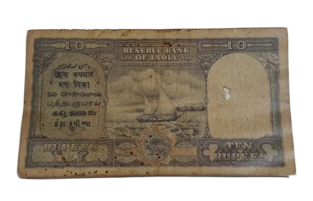 BRITISH INDIA 10 Rupees C.D DESHMUKH King GEORGE-VI in Collectable Grade but "LAMINATED" Note.