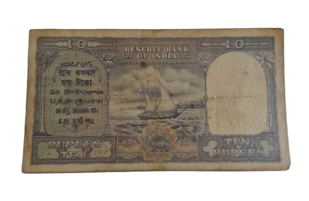 BRITISH INDIA 10 Rupees C.D DESHMUKH King GEORGE-VI in Collectable Grade but "LAMINATED" Note.