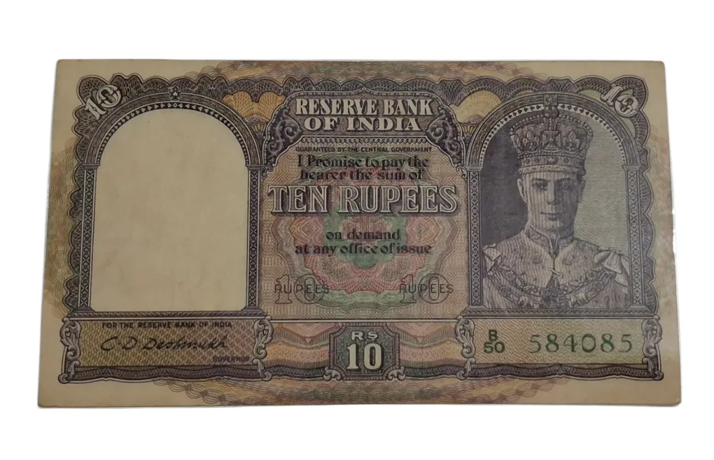 BRITISH INDIA 10 Rupees C.D DESHMUKH King GEORGE-VI in High Collectable Grade but "LAMINATED" Note.