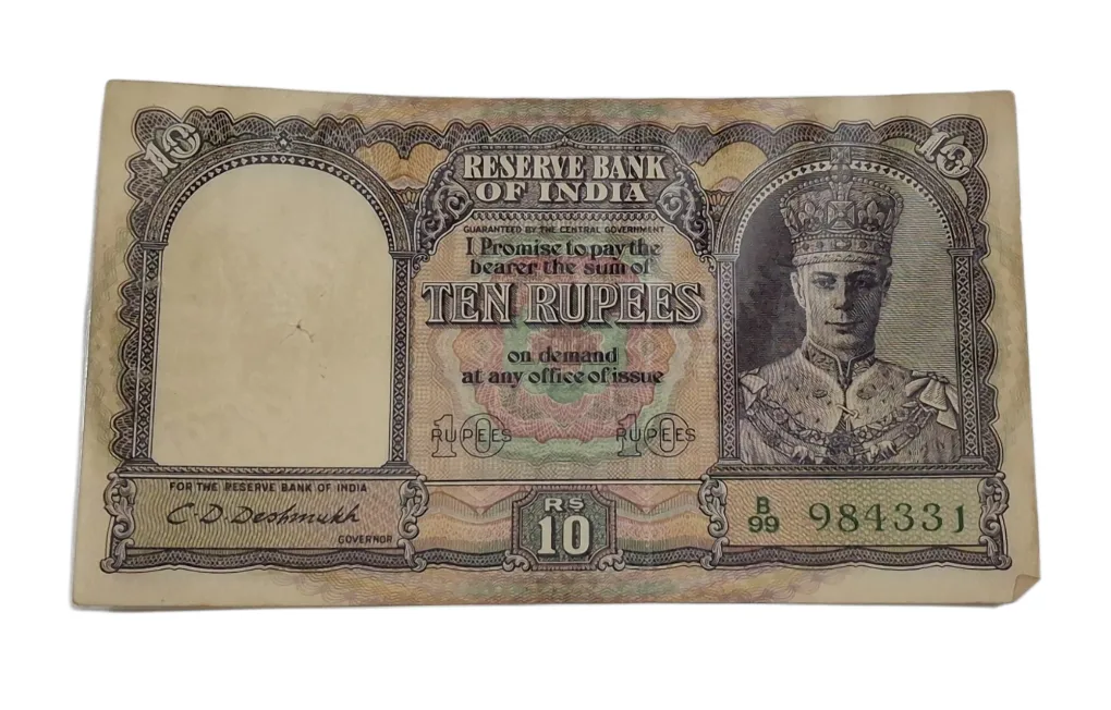 BRITISH INDIA 10 Rupees C.D DESHMUKH King GEORGE-VI in High Collectable Grade but "LAMINATED" Note.