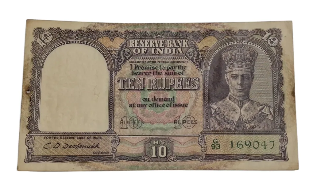 BRITISH INDIA 10 Rupees C.D DESHMUKH King GEORGE-VI in High Collectable Grade but "LAMINATED" Note.