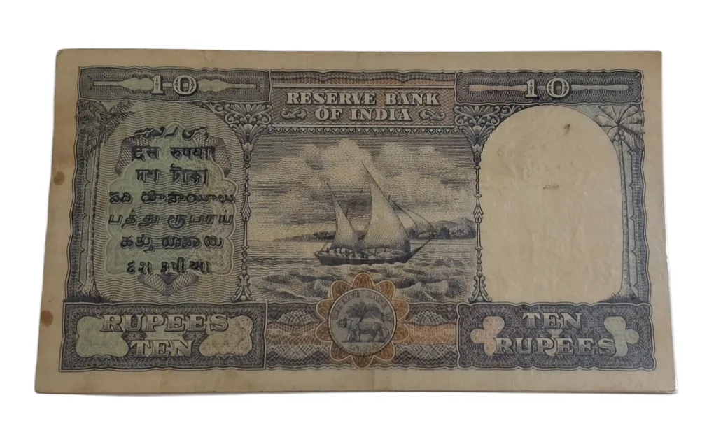BRITISH INDIA 10 Rupees C.D DESHMUKH King GEORGE-VI in High Collectable Grade but "LAMINATED" Note.
